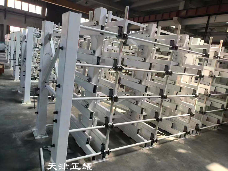 棒料是地面堆放還是用伸縮懸臂式棒料貨架存放